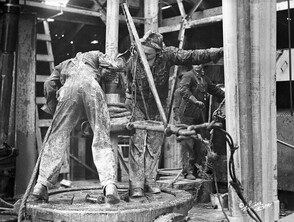 Operations on drilling floor in Turner Valley, Alberta
