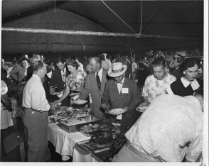Dollinger Steel Fiftieth Anniversary Guests in Food Line (AC604-1A-016-036)