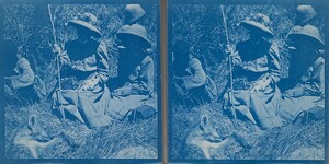 Gunbearer Muhammed bin Juma, Mary Gallen-Kallela and her children, Kirsti and Jorma, sitting in front of a dead hyena on Kahara Mountain, April 1910.