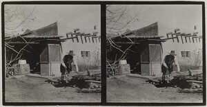 Akseli Gallen-Kallela sawing a trunk at the Gallen-KallelasÂ´ house in Taos, New Mexico, ca.1925.