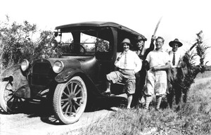 Four men with machetes