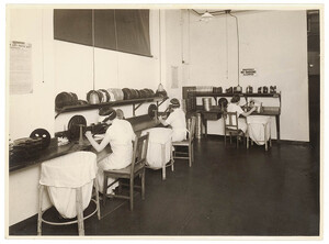 [Women cleaning, repairing and rewinding films], n.d. by Sam Hood