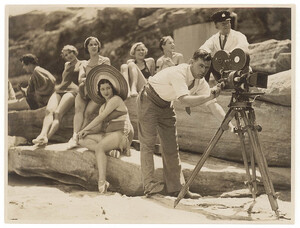 Men and women at the beach, filming with a hand wound camera, New South Wales, ca. 1935, Sam Hood